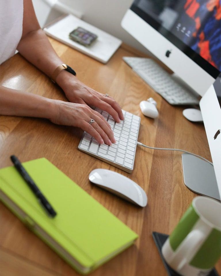 Jeanette Elton working at her desk
