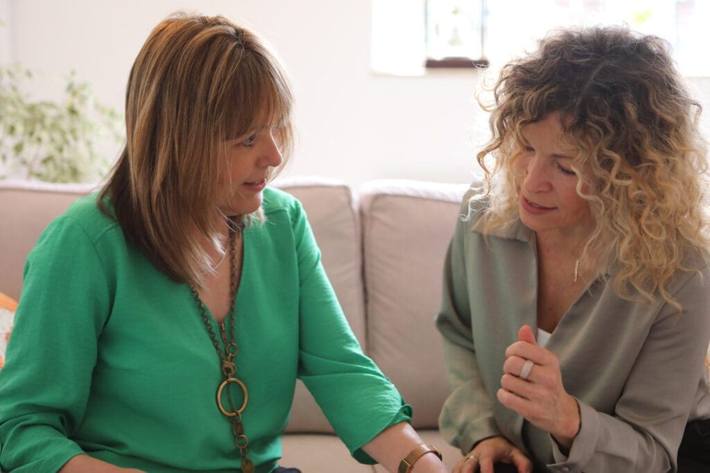 Jeanette and Dawn having a catch up about her website updates.